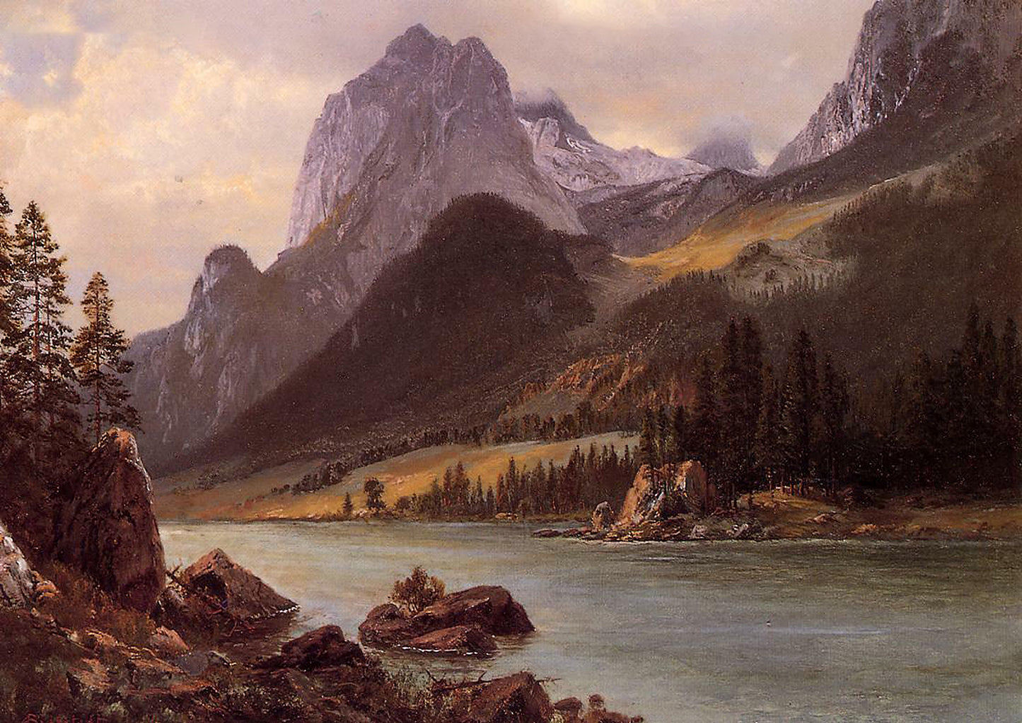Oil painting of The Rocky Mountains by Albert Bierstadt, featuring a glacial alpine lake reflecting towering granite peaks under a stormy sky with dark conifer forests and rocky outcroppings in the foreground.