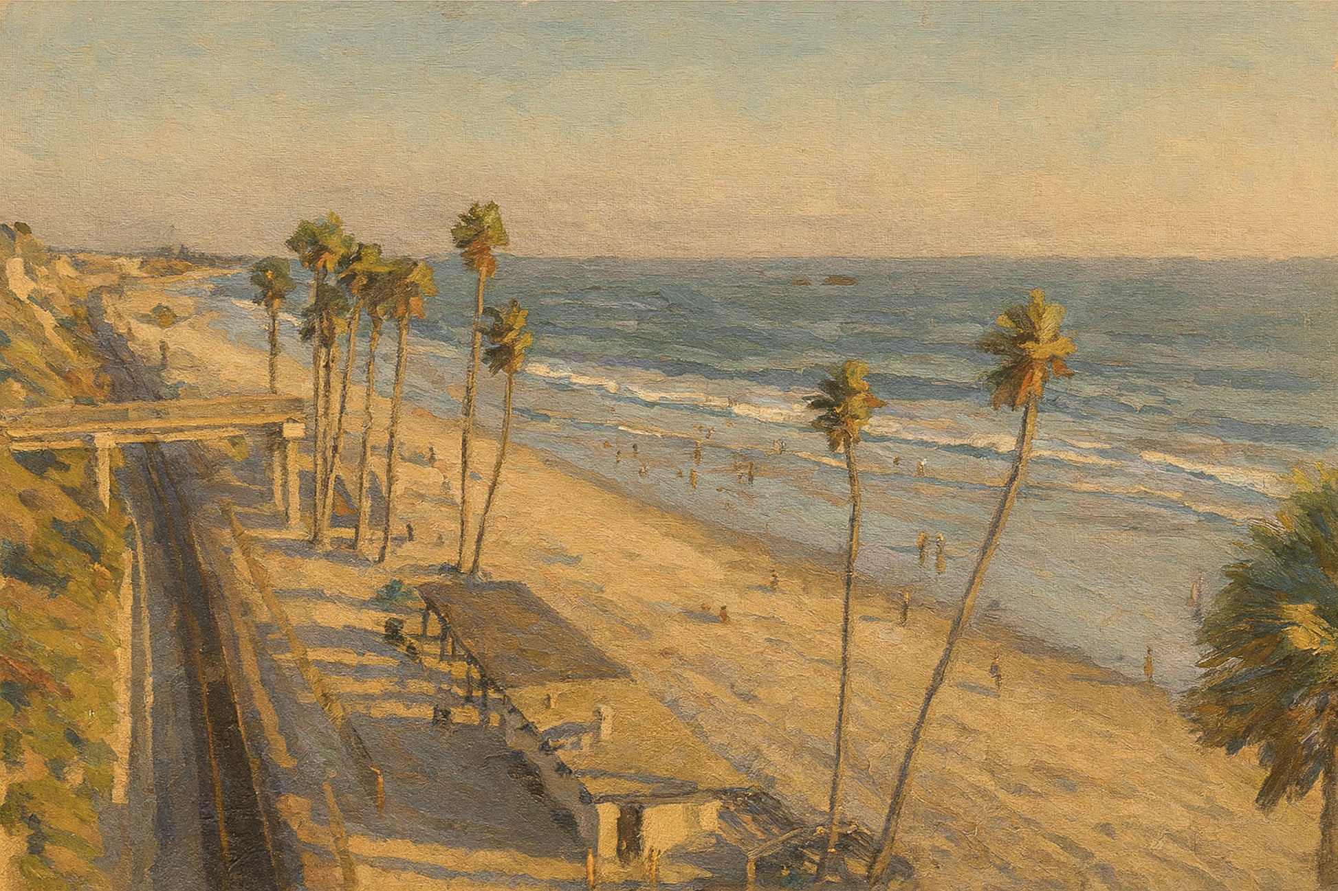 Train tracks tracing the San Clemente shoreline with the southwest horizon glowing over the Pacific near sunset.