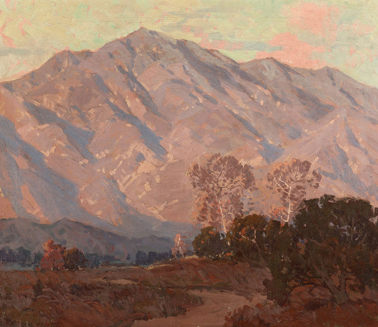 Oil painting of Sunset on the Foothills of Pasadena by Edgar Payne, featuring the San Gabriel foothills glowing in dusty pink and mauve at sunset with bare winter sycamore trees silhouetted below.